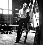 Jackson Pollock in his barn studio, summer-fall 1950. The picture credit is Hans Namuth. &copy;1998 Hans Namuth Ltd.
